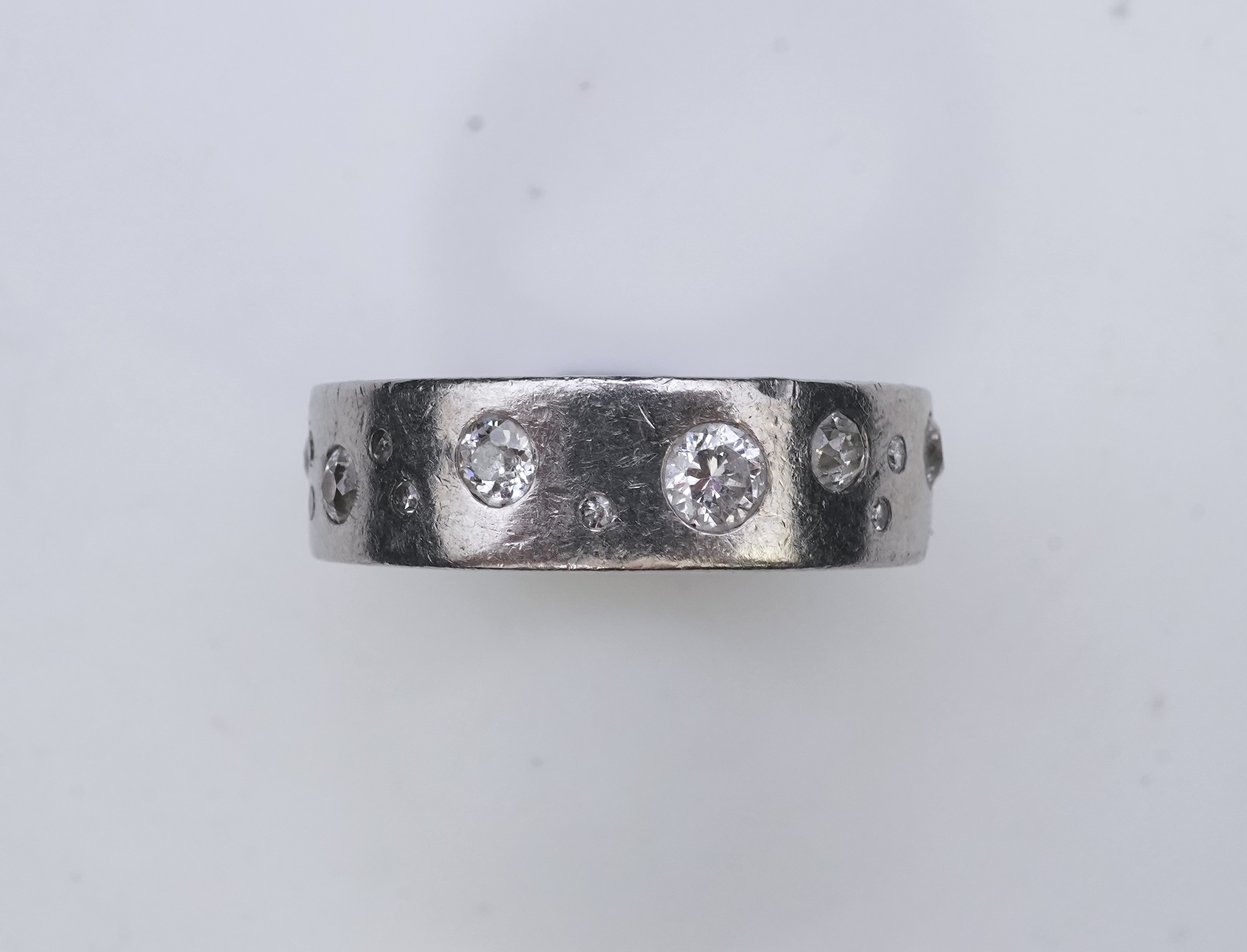 A platinum and diamond eternity ring